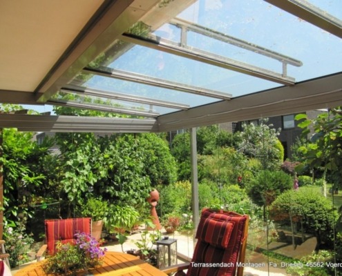 terrassendach_vor_balkon_montiert_aufgesetzte_markise_glastren_ber_eck__verschiebbar_herne-8446b7e6